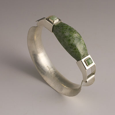 green jadeite and sterling silver bangle